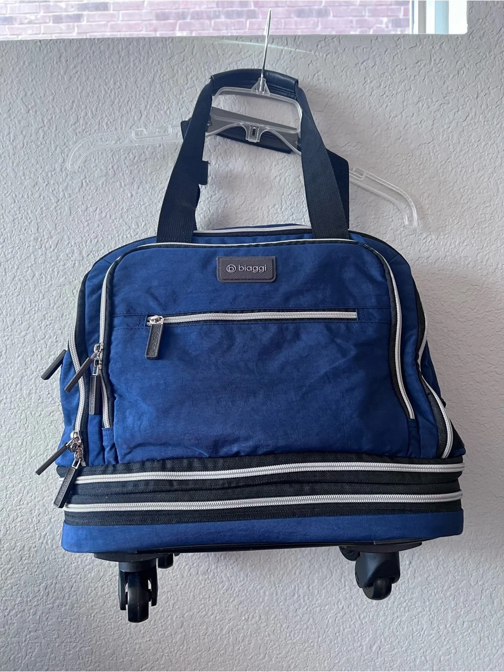 Biaggi Navy Rolling Travel Duffel with Front Zip Pocket